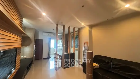 Spacious modern living room with sleek design and ample natural light