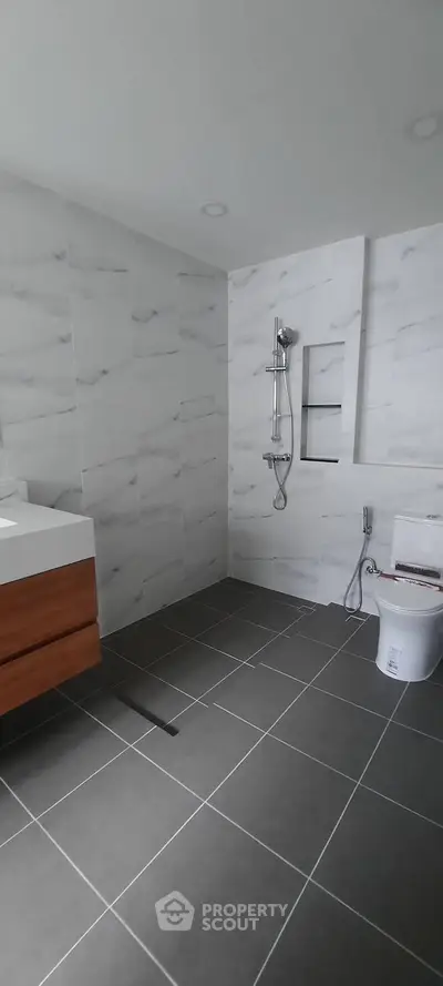 Modern bathroom with sleek tile design and contemporary fixtures