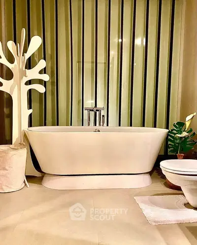 Luxurious bathroom with modern freestanding bathtub and stylish decor