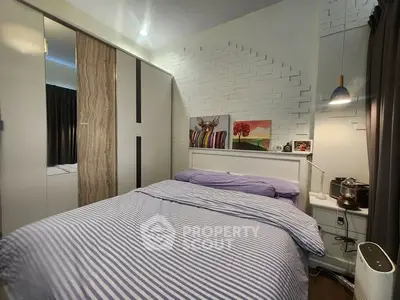 Cozy bedroom with modern decor and ample storage space