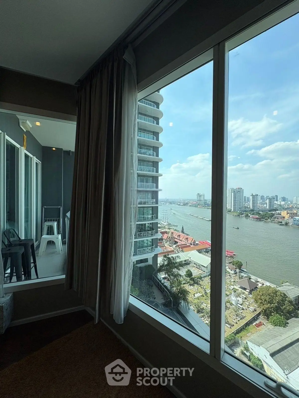 Stunning river view from modern high-rise apartment window