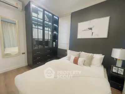 Modern bedroom with elegant decor and built-in wardrobe