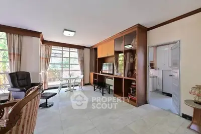 Spacious living room with elegant decor and natural light