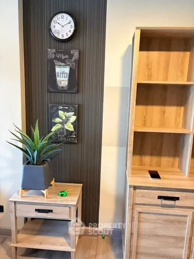 Modern living room with stylish wooden furniture and decorative wall art