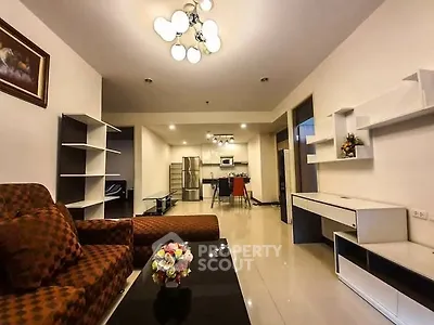 Spacious modern living room with open kitchen and stylish furniture