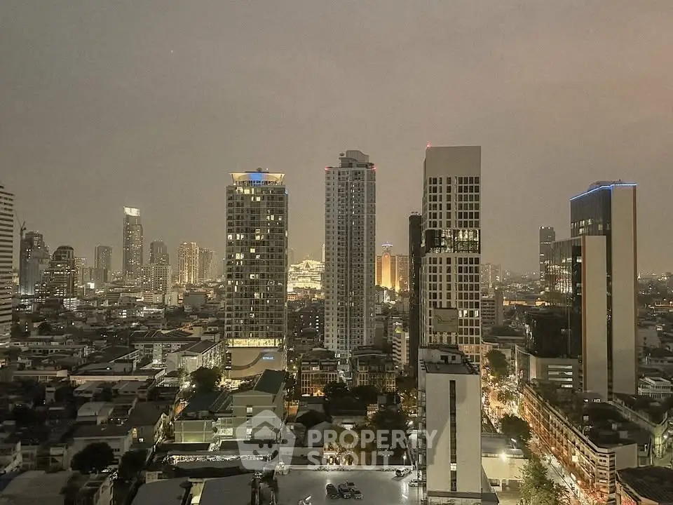 Stunning cityscape view from a high-rise building at dusk, showcasing urban skyline.