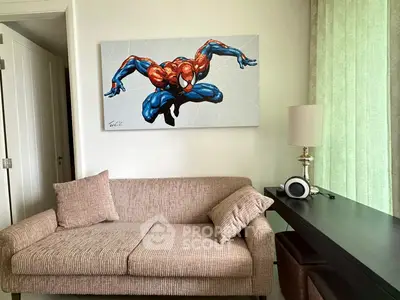 Modern living room with stylish sofa and superhero wall art