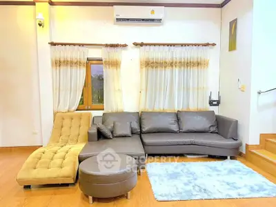 Spacious living room with modern furniture and elegant decor