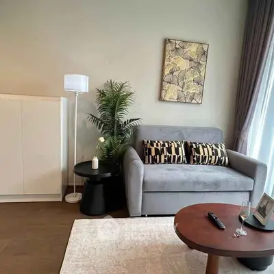 Stylish living room with modern decor, cozy sofa, and elegant furnishings.