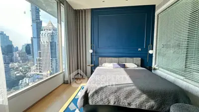 Luxurious bedroom with stunning city view and modern decor