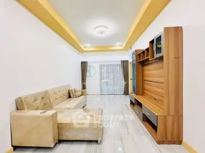 Spacious living room with modern furniture and elegant lighting