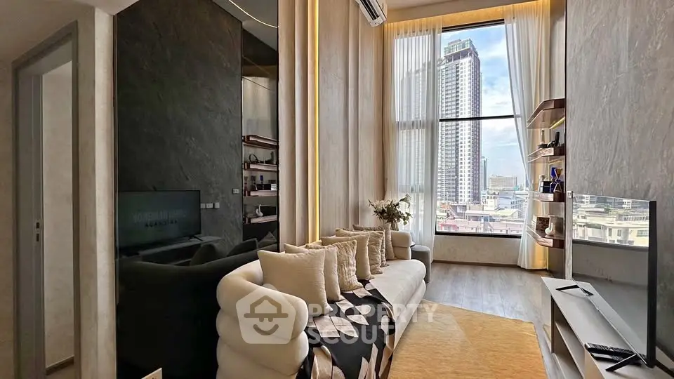 Luxurious living room with high ceilings and stunning city view