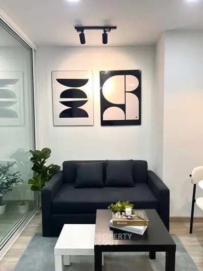 Modern living room with stylish decor and cozy seating area
