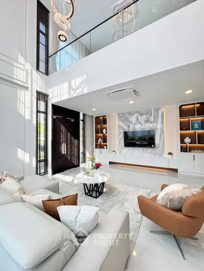 Luxurious modern living room with high ceilings and elegant decor