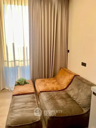 Cozy living room with plush seating and natural light