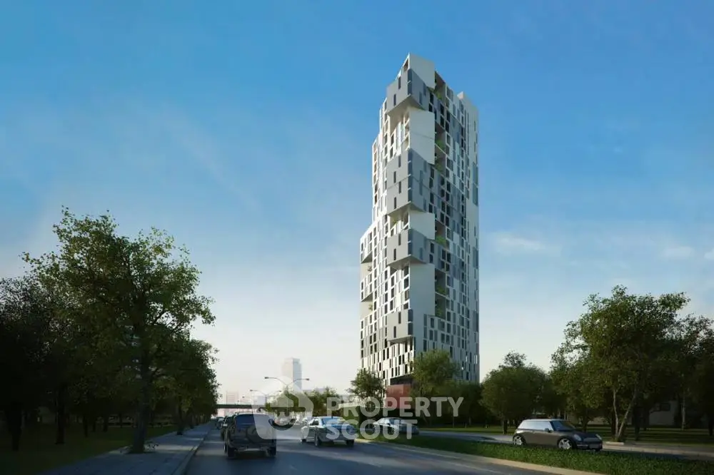 Stunning modern high-rise building with unique architectural design in urban setting.