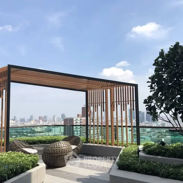 Stunning rooftop terrace with city skyline views and modern seating area.