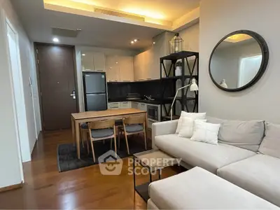 Modern living room with open kitchen and stylish decor