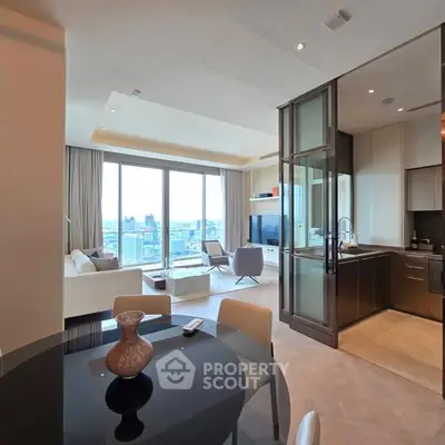 Luxurious open-plan living room with stunning city view and modern kitchen