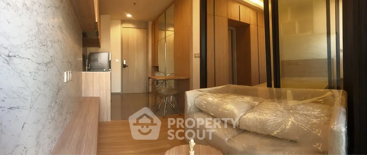 Modern studio apartment with open layout and stylish furnishings