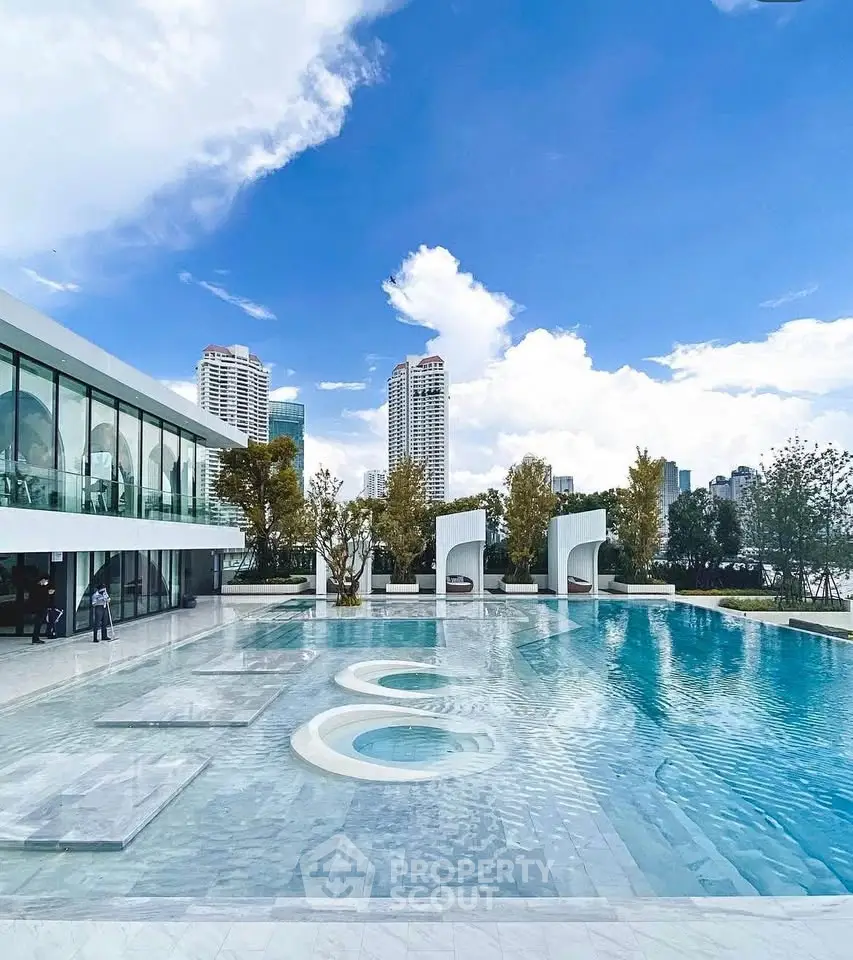 Luxurious rooftop pool with stunning city skyline views and modern architecture.