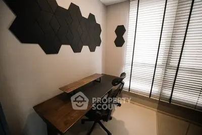 Modern study room with stylish wall panels and ergonomic chair