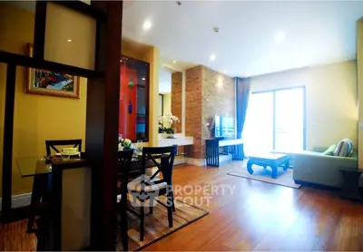 Spacious modern living room with wooden flooring and stylish decor