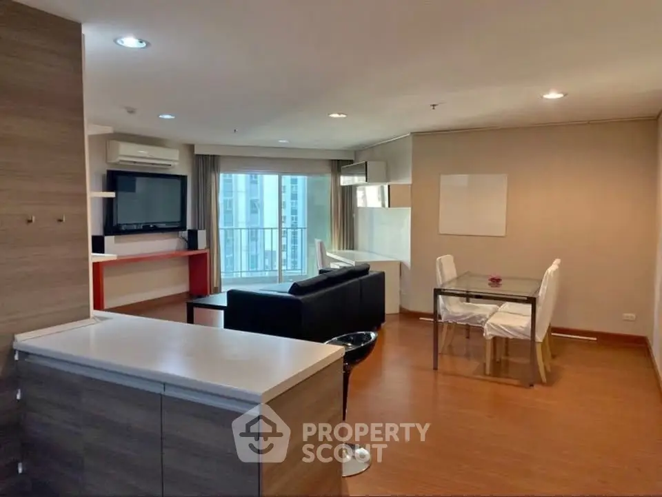 Spacious modern living room with open layout and city view