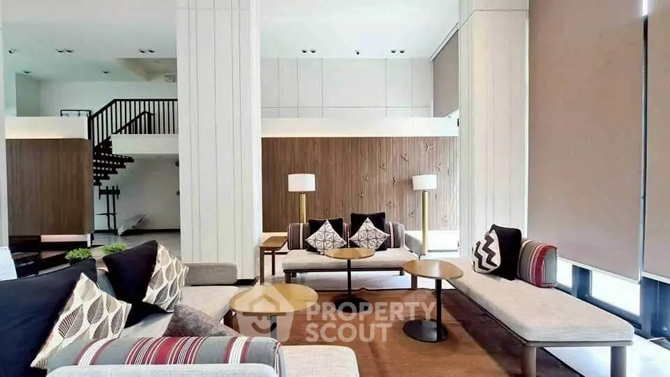 Spacious modern living room with stylish furniture and natural light