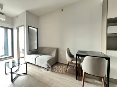 Modern living room with minimalist furniture and natural light