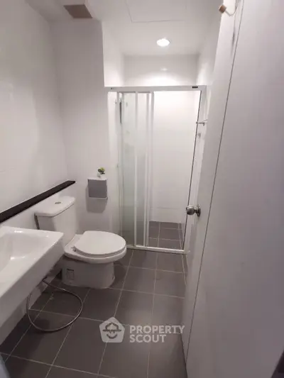 Modern bathroom with sleek design and glass shower enclosure