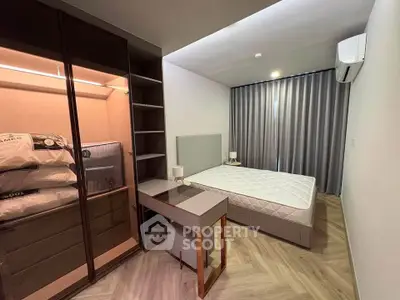 Modern bedroom with sleek wardrobe and stylish decor