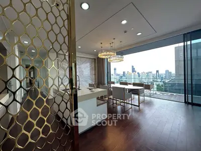 Luxurious open-plan living room with stunning city view and elegant decor