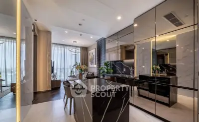 Luxurious modern kitchen with sleek black marble island and open layout
