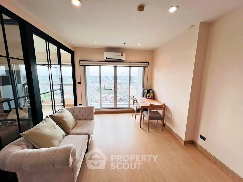 Spacious living room with panoramic city view and elegant furnishings