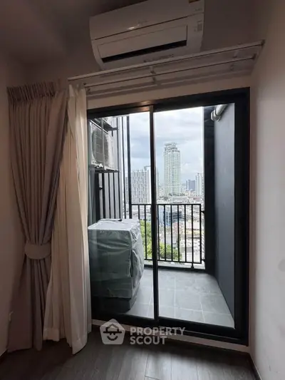 Modern apartment balcony with city view and air conditioning unit