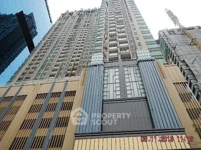 Stunning high-rise building with modern architectural design and impressive facade.