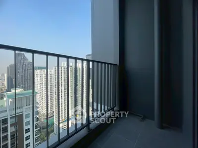 Modern balcony with stunning city view in high-rise apartment