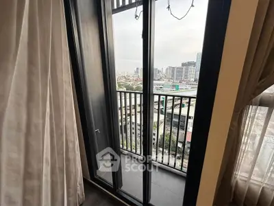 Chic urban balcony with city skyline view, perfect for relaxation and enjoying the vibrant city life.