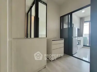 Modern apartment interior with sleek kitchen and spacious layout