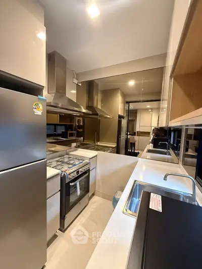 Modern kitchen with sleek appliances and ample counter space