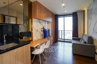 Modern living room with stylish decor and city view balcony