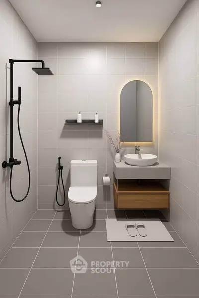 Modern minimalist bathroom with sleek fixtures and neutral tiles