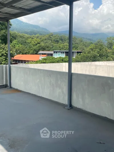 Spacious balcony with stunning mountain views and modern design