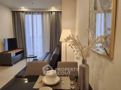 Modern living room with elegant dining area and stylish decor