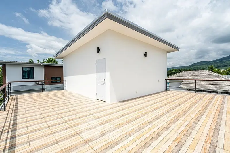 Spacious rooftop terrace with scenic mountain views and modern design.