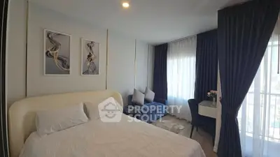 Elegant bedroom with modern decor and natural light