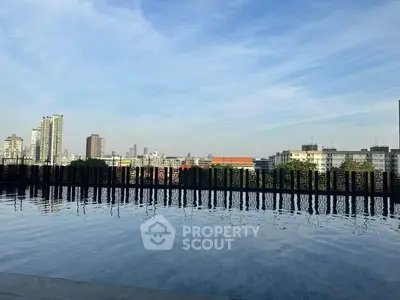 Stunning rooftop pool with panoramic city skyline views