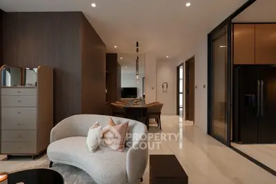 Luxurious modern living room with elegant furniture and open layout, perfect for stylish urban living.