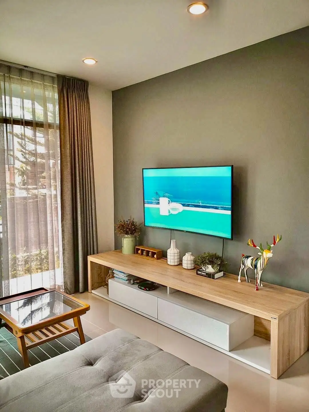 Modern living room with sleek TV setup and stylish decor